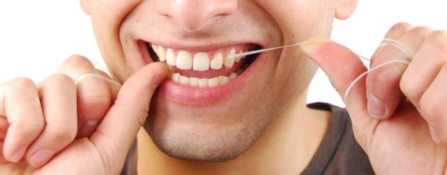 flossing-for-a-beautiful-smile-healthy-teeth-and-gums